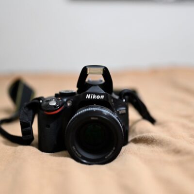 Nikon D5100 DSLR Camera with 18-55mm VR Lens, 50mm prime, and 35mm prime lenses