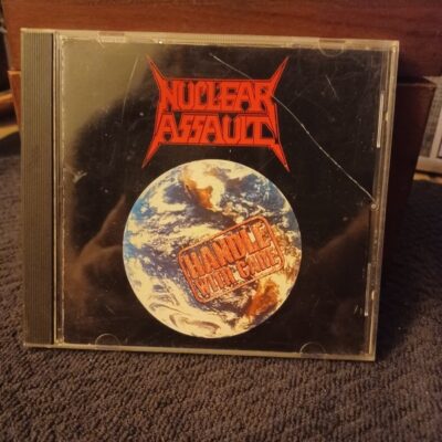 NUCLEAR ASSAULT – HANDLE WITH CARE