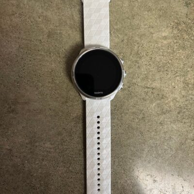 White Suunto 9 watch and charger